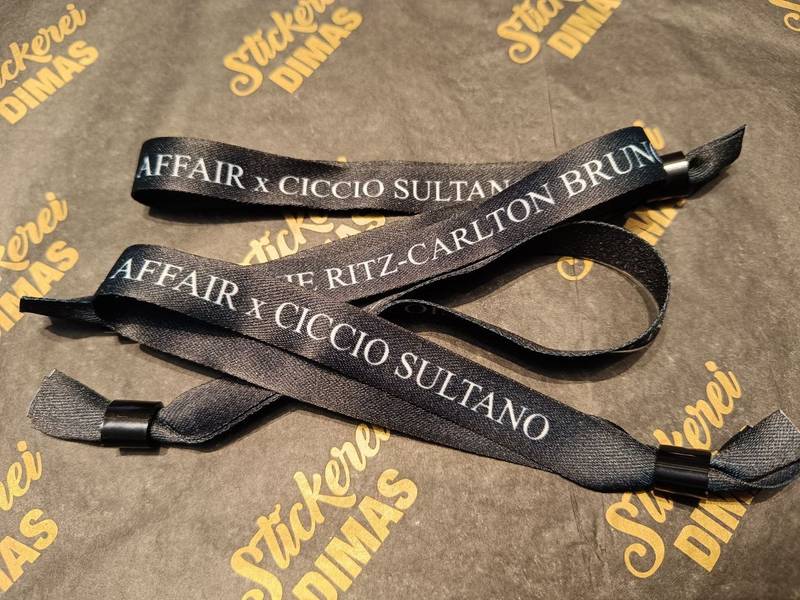 Ritz-Carlton Einlassbänder, Schwarze Event-Armbänder bedruckt Wien